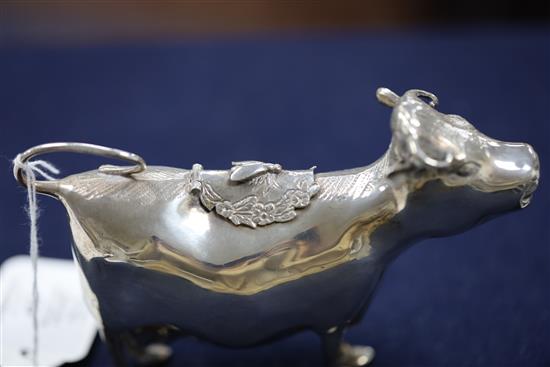A late 1950s silver cow creamer by William Comyns & Sons Ltd, length 15.3cm.